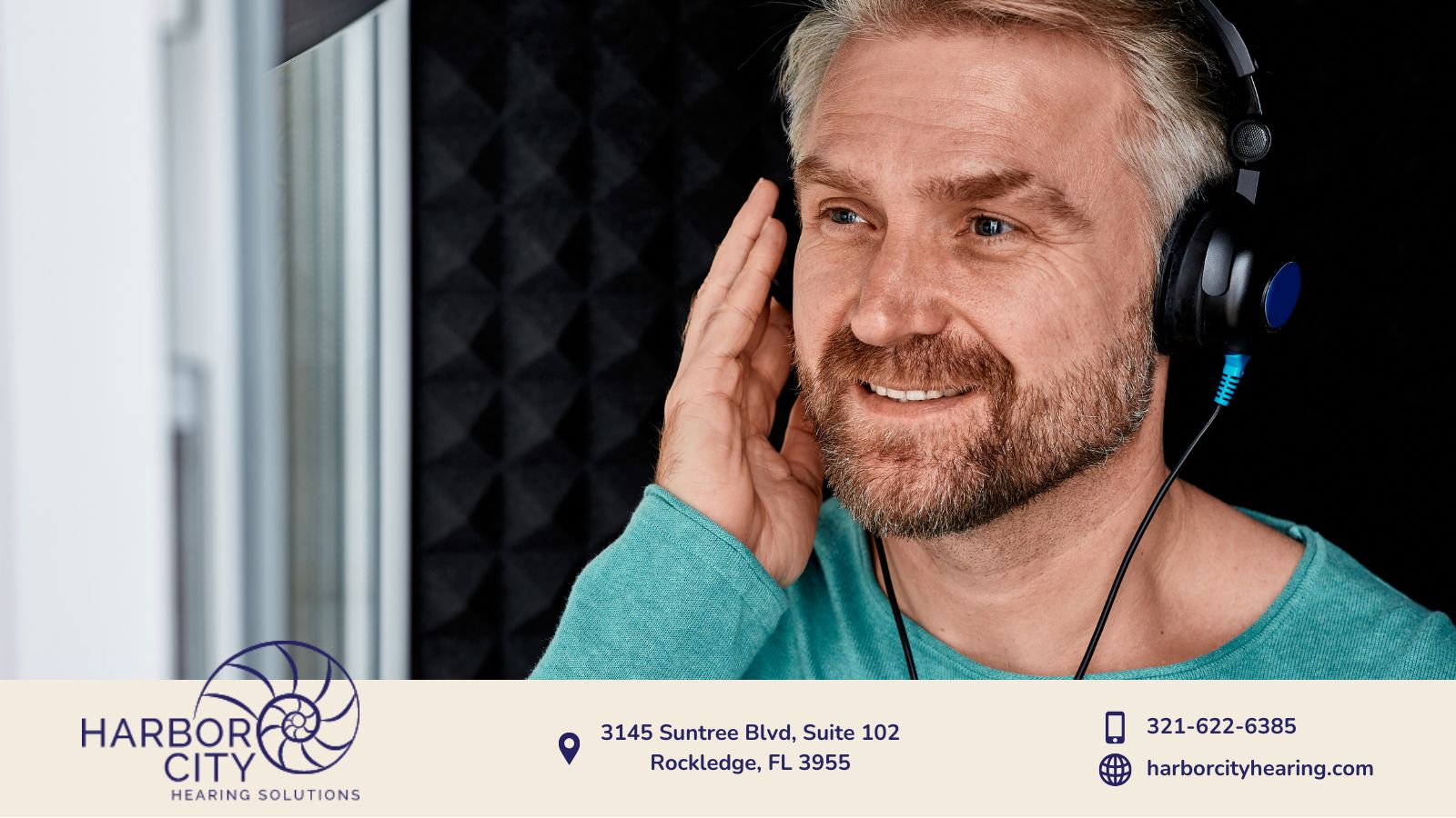 Patient wearing headphones during a pure tone audiometry hearing test at Harbor City Hearing Solutions